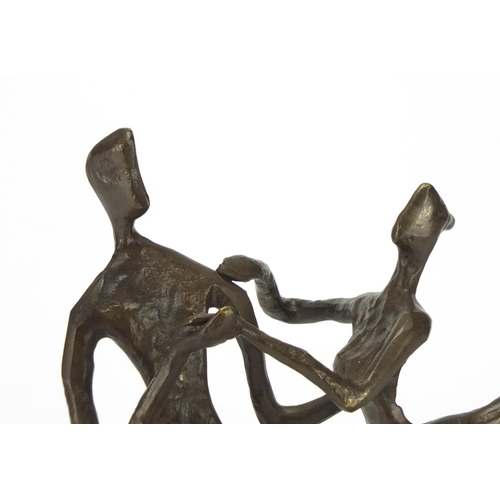 2215 - Modernist patinated bronze figure group of two dancers and a similar example, the largest 25cm high