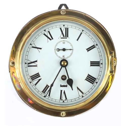 2209 - Sestrel brass ships bulk head clock, with subsidiary dial and Roman numerals, 20.5cm in diameter