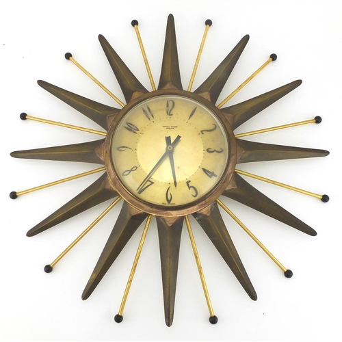 2043 - 1970's Anstey & Wilson sunburst design wall clock, with Arabic numerals, 48cm in diameter