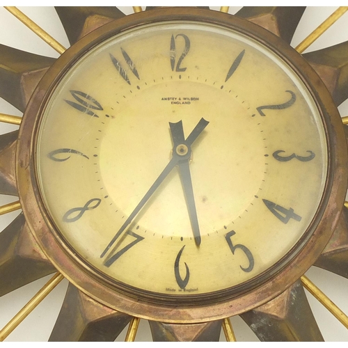 2043 - 1970's Anstey & Wilson sunburst design wall clock, with Arabic numerals, 48cm in diameter
