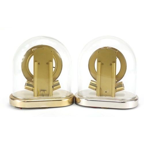 2205 - Two Junghans Anticlimatic electronic mantel clocks with glass domes, each 23.5cm high