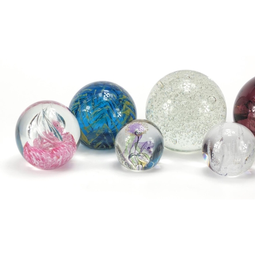 2211 - Colourful glass paperweights including a large Mdina example and Caithness Moon Landing limited edit... 