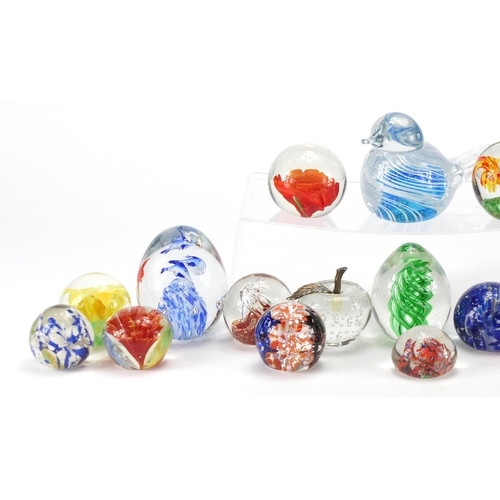 2132 - Colourful glass paperweights including bird design, Guernsey and Avondale glass examples, the larges... 