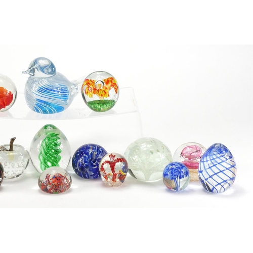 2132 - Colourful glass paperweights including bird design, Guernsey and Avondale glass examples, the larges... 