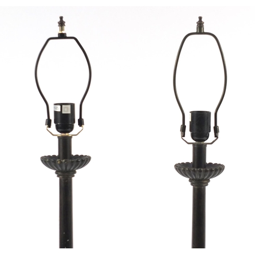 2031 - Pair of large bronzed and alabaster lamps, each 74cm high excluding the fittings