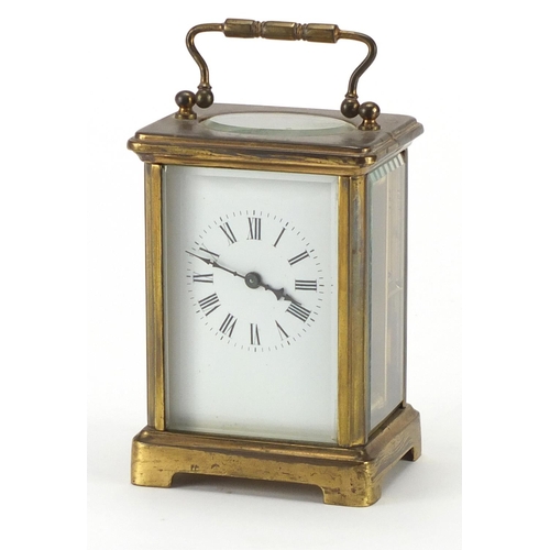 2096 - Brass cased carriage clock with enamelled dial and Roman numerals, 11cm high