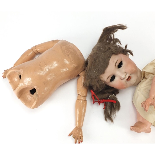 2333A - Two Armand Marseille bisque headed dolls with jointed limbs, one numbered 99013 the other 390 15, th... 