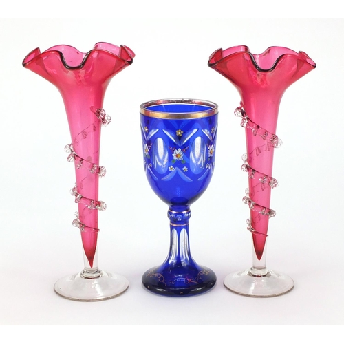 2101 - Pair of Victorian cranberry glass vases with trailed decoration and a Bohemian blue flashed goblet h... 