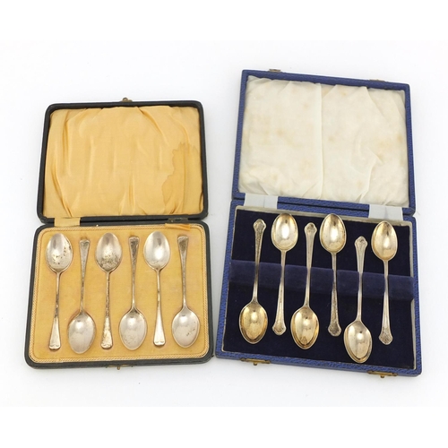 2284 - Two sets of silver teaspoons, Birmingham and Sheffield hallmarks, with fitted cases, the largest 11c... 