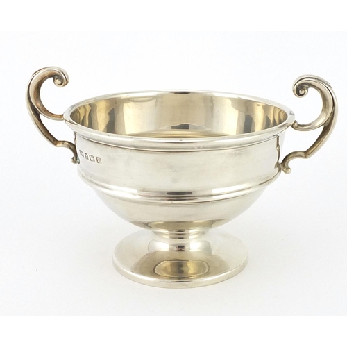 2257 - Silver pedestal twin handled cup, by Charles Weale Birmingham 1924, 8.5cm high, approximate weight 1... 