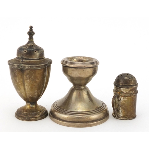 2272 - Silver urn shaped caster, dwarf candlestick and one other caster, various hallmarks, the largest 8.5... 