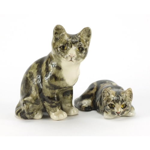 2245A - Two Winstanley pottery seated cats with beaded eyes, the largest 21.5cm high