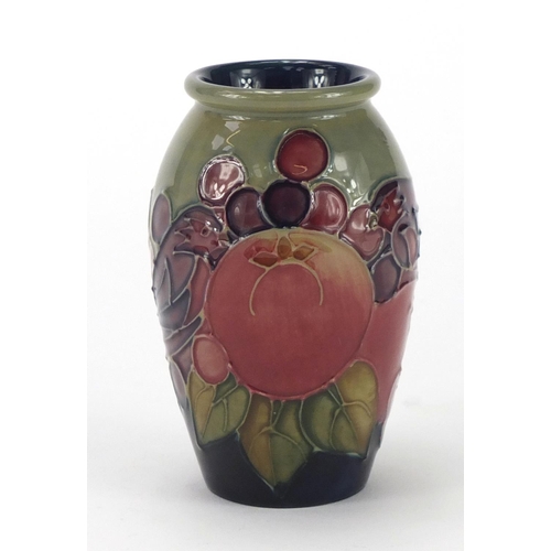 2054 - Moorcroft pottery vase hand painted birds and berries, 10.5cm high