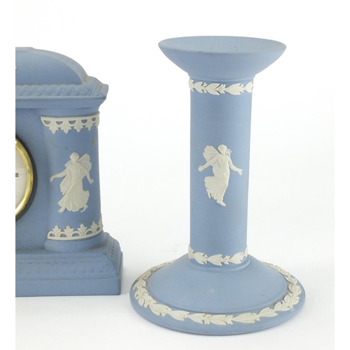2059 - Wedgwood Jasper Ware mantel clock and a pair of dancing maidens candlesticks, the largest, 15cm high