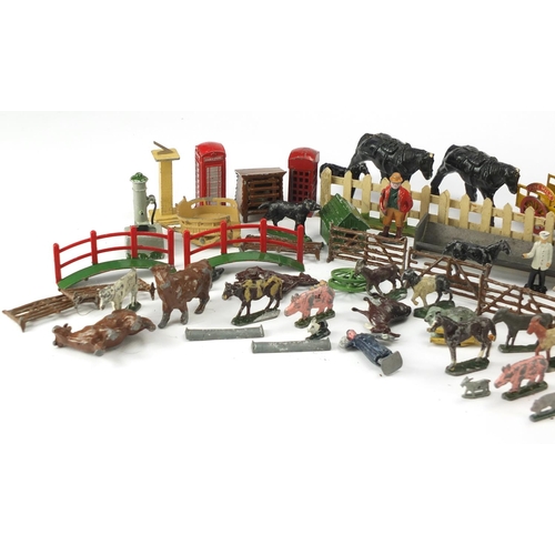2337 - Predominantly hand painted lead toys including farmyard animals and accessories, Dinky Toys police b... 