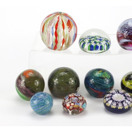 2069 - Colourful glass paperweights including Mdina, Maltese, Caithness and Millefiori examples, the larges... 