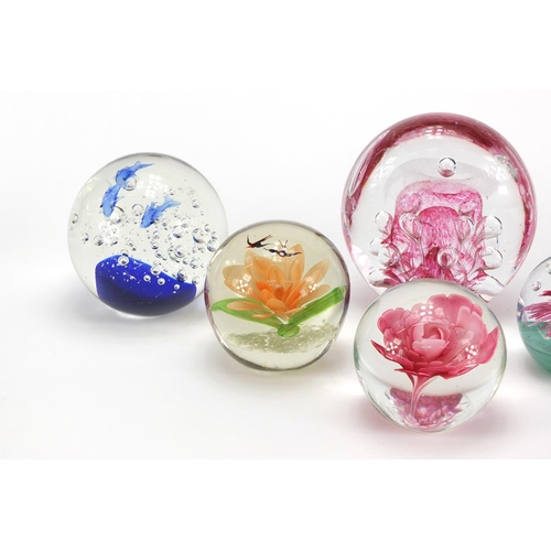 2148 - Six large colourful glass paperweights including dolphin and bird design examples , the largest 14cm... 