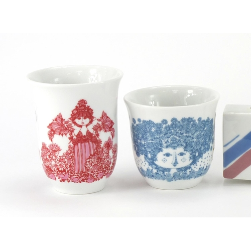 2164 - Four Danish porcelain beakers designed by Bjorn Wiinblad and a Royal Dux flower vase, the largest 11... 
