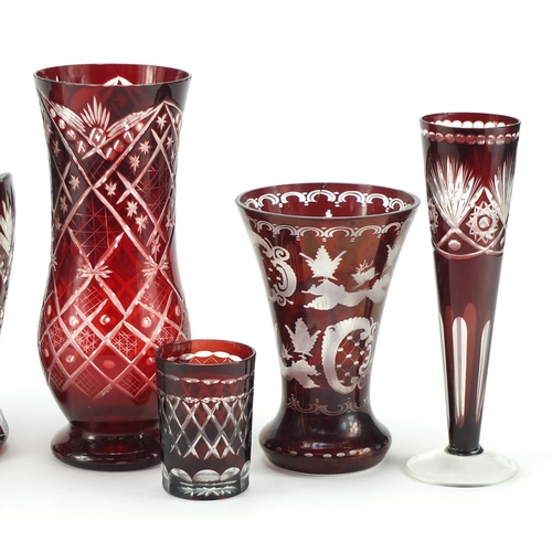 2146 - Six Bohemian ruby flashed glass vases including one etched with buildings and flowers, the largest 2... 
