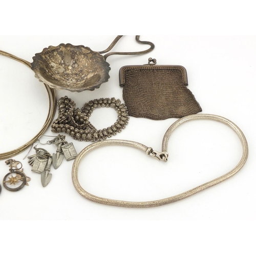 2277 - Silver and white metal objects and jewellery including a silver chain link purse, strainer, necklace... 
