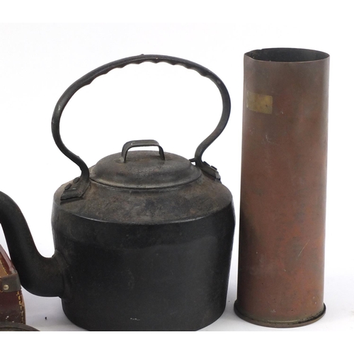 865 - Miscellaneous items including a Holcroft cast iron teapot, Military shell case and Bakelite electric... 