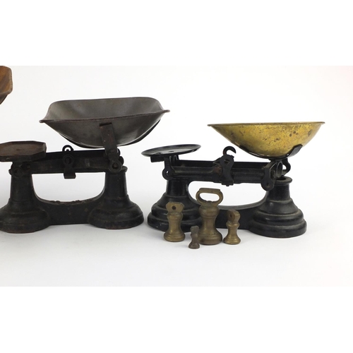 111 - Three sets of Victorian cast iron scales with weights including Avery