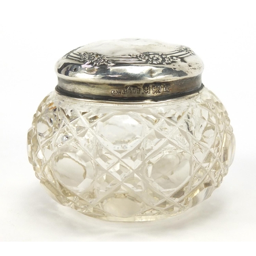 576 - Cut glass jar with silver lid, two silver sports jewels, one white metal and a Georgian shilling