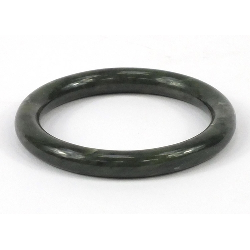 658 - Chinese spinach jade bangle, 8cm in diameter