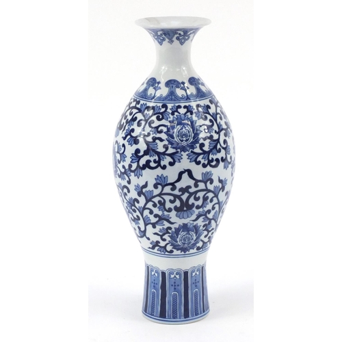 409 - Chinese blue and white porcelain vase decorated with foliage, 45cm high