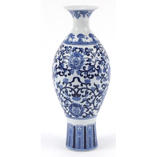 409 - Chinese blue and white porcelain vase decorated with foliage, 45cm high
