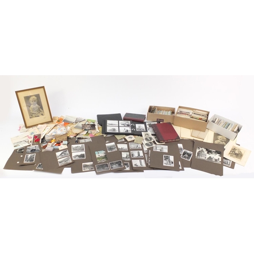 976 - Ephemera including Edwardian and later postcards, black and white photographs, stamps and greetings ... 