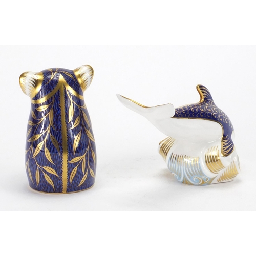2234 - Royal Crown Derby dolphin and koala paperweights, with stoppers and boxes, the largest 15cm in lengt... 