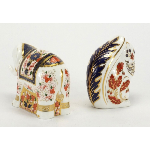 2239 - Royal Crown Derby Imari elephant infant and squirrel paperweights, with stoppers and boxes, the larg... 