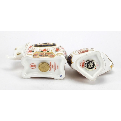 2239 - Royal Crown Derby Imari elephant infant and squirrel paperweights, with stoppers and boxes, the larg... 