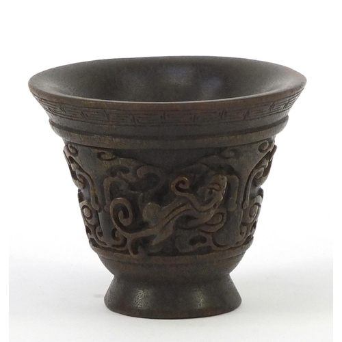 617 - Horn style beaker decorated with mythical animals, 8.5cm high