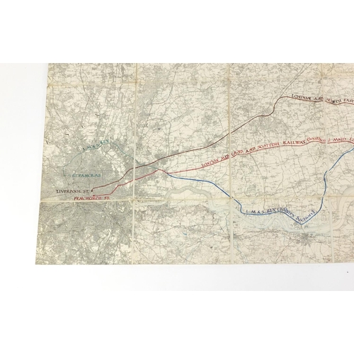 914 - Edward Stanford folding canvas map of railway routes, 140cm x 77cm