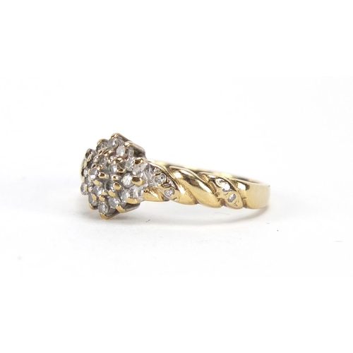2405 - 9ct gold diamond three tier cluster ring, size M, approximate weight 2.2g