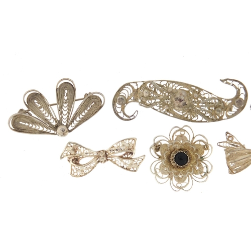 2427 - Six silver filigree brooches, the largest 5.5cm in length, approximate weight 22.8g