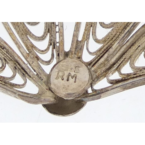 2427 - Six silver filigree brooches, the largest 5.5cm in length, approximate weight 22.8g