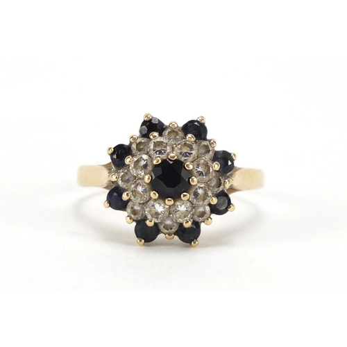 2438 - 9ct gold sapphire and cubic zirconia flower head ring, size R, approximate weight 3.0g