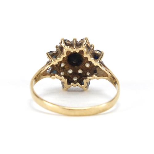 2438 - 9ct gold sapphire and cubic zirconia flower head ring, size R, approximate weight 3.0g