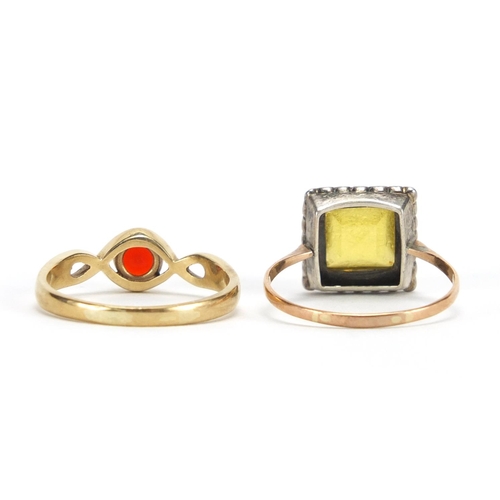 2424 - Unmarked gold garnet ring and a 9ct gold and silver marcasite ring, size U, approximate weight 6.6g