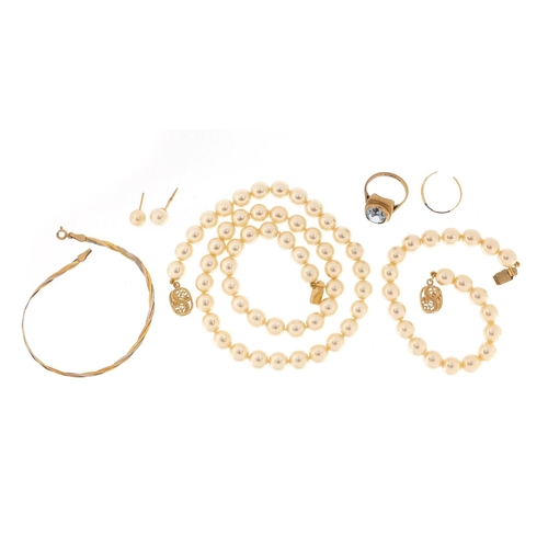 2398 - 9ct gold ring, 9ct gold bracelet and pearl jewellery suite housed in a Mallorca box