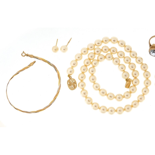 2398 - 9ct gold ring, 9ct gold bracelet and pearl jewellery suite housed in a Mallorca box