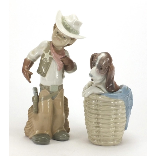 2243 - ** WITHDRAWN **Lladro figure of a cowboy and dog in a basket, the largest 26.5cm high