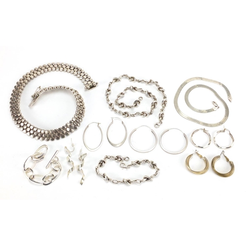 2386 - Silver and white metal jewellery including a heavy necklace, hoop earrings and bracelets, approximat... 