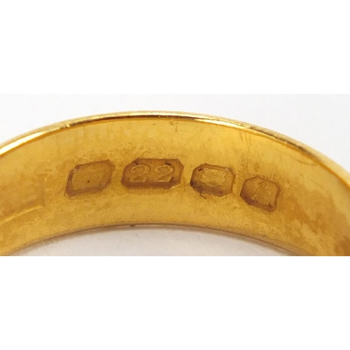 2348 - 22ct gold wedding band with engraved decoration, size O, approximate weight 5.4g
