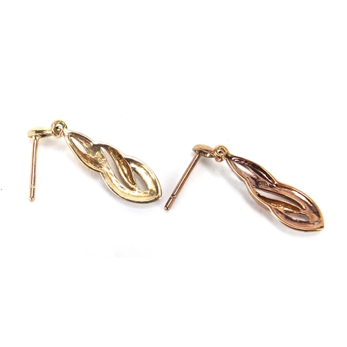 2428 - Pair of 9ct two tone gold diamond earrings, 2.5cm in length, approximate weight 1.2g