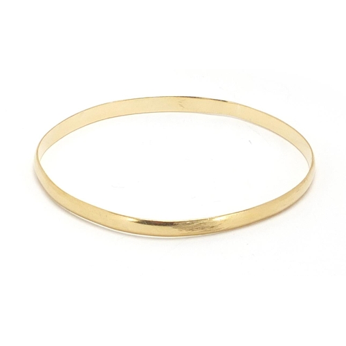 2353 - 9ct gold bangle, 7cm in diameter, approximate weight 9.4g