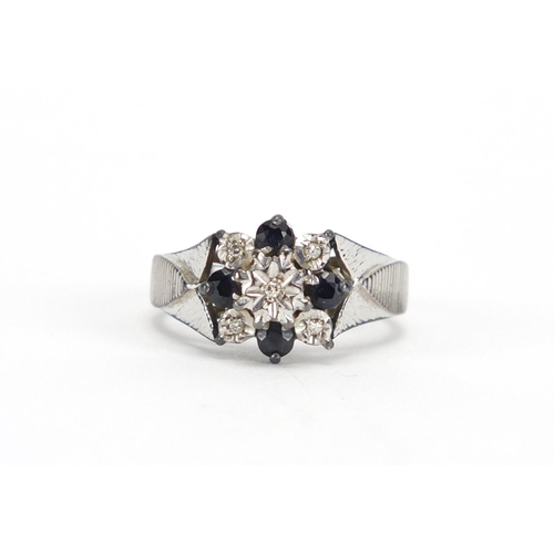 2392 - 9ct gold diamond and sapphire ring, size M, approximate weight 4.3g